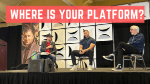 Where is YOUR platform? Photo of Paul M. Neuberger, Tim Tebow, and Matt Maher on stage at the Covering the World in Christ Celebration